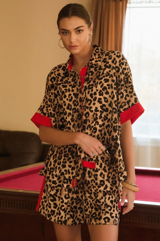 Leopard print short sleeve blouse with red trim