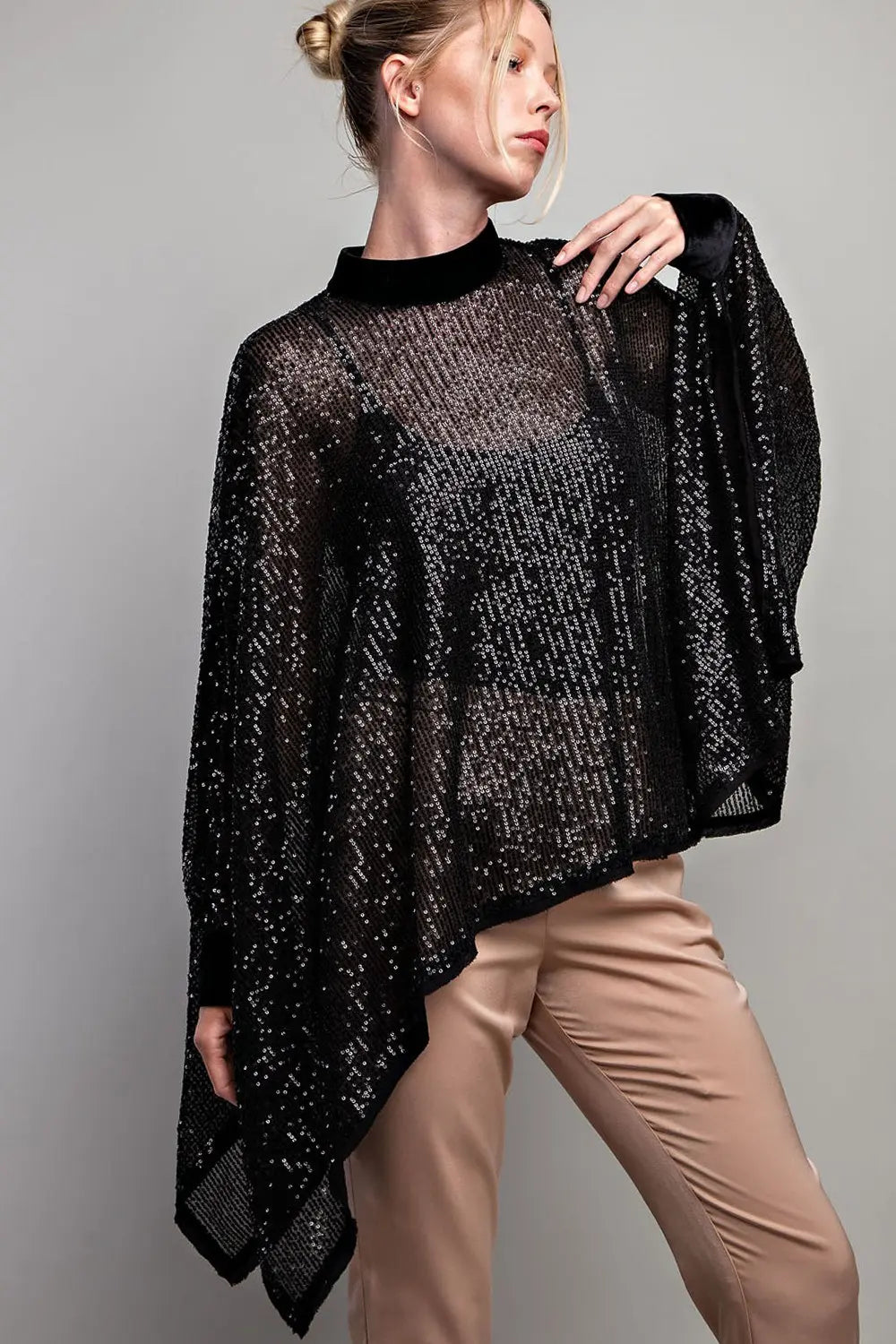 Black sequin poncho top with velour trim