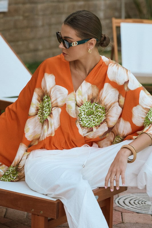 Orange floral batwing front wrap blouse