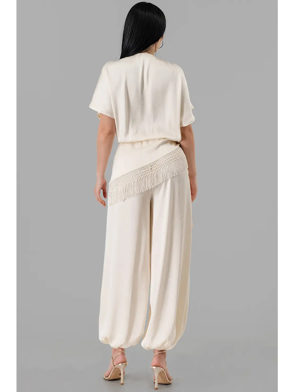 Draped V-Neck Satin Jumpsuit with Fringe Trim