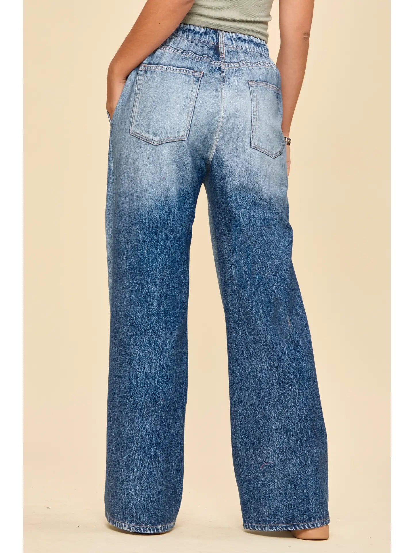 Medium wash pull on sweatpant jeans