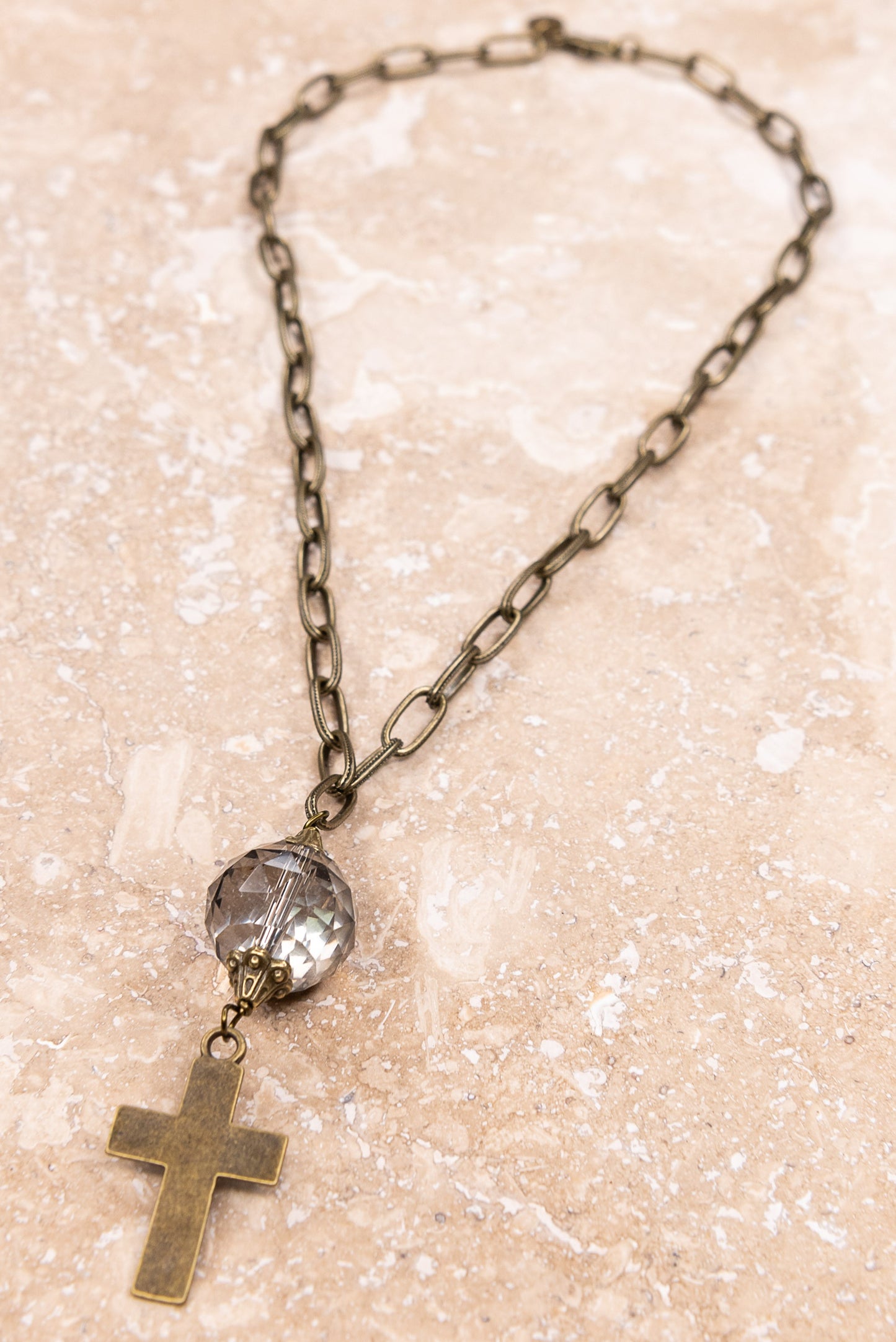 Short bronze chain link necklace with cross