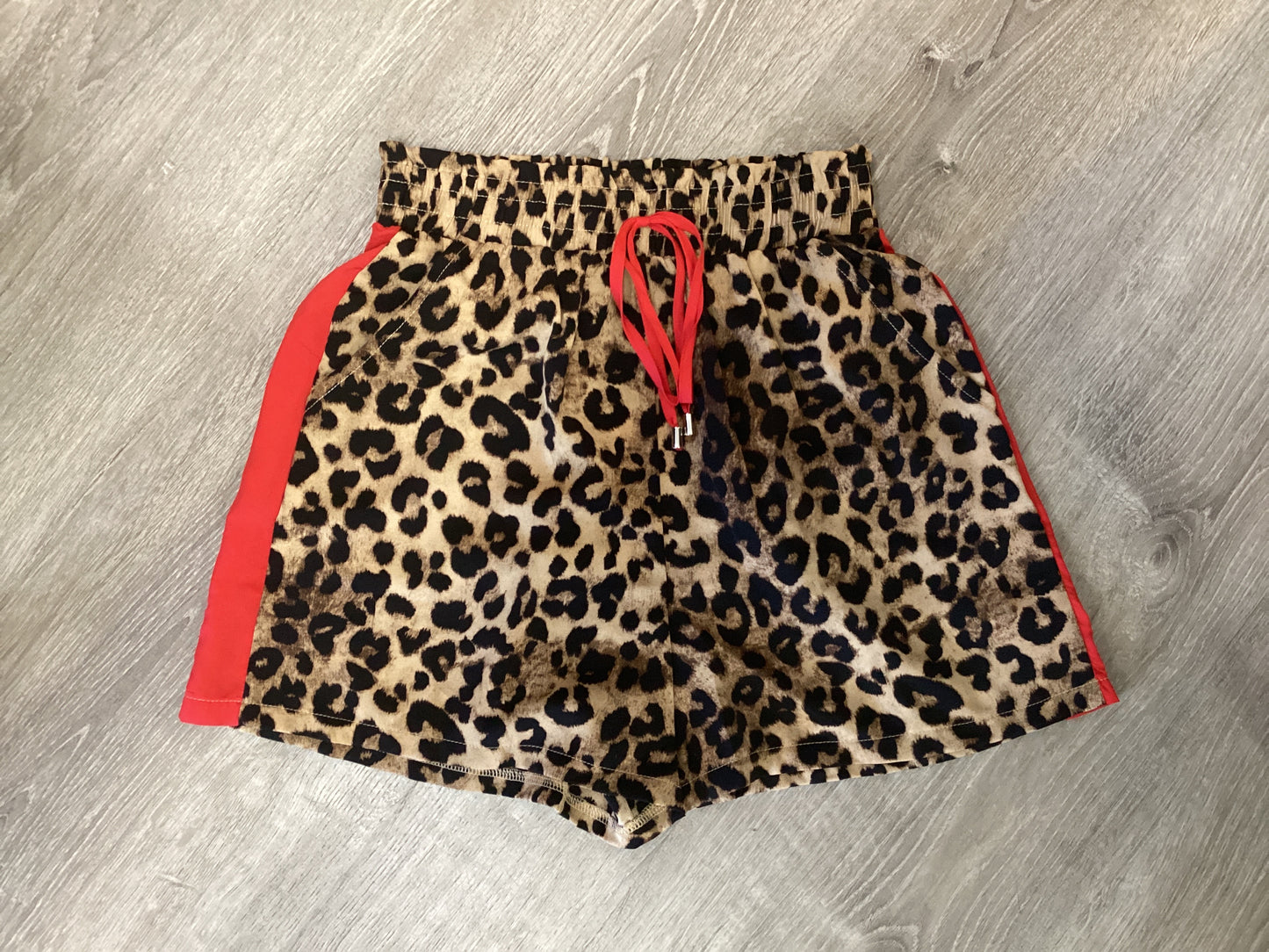 Leopard pull on shorts with red trim