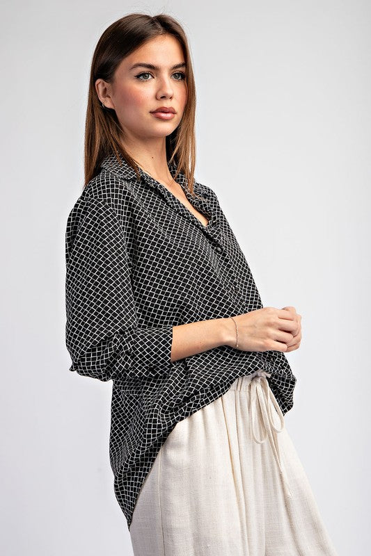 Black and white geometric print blouse