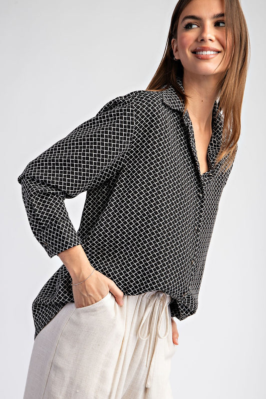 Black and white geometric print blouse