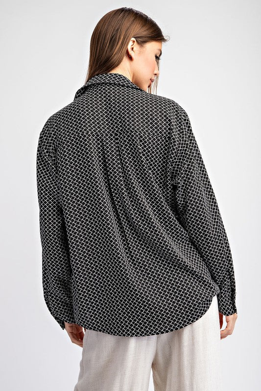 Black and white geometric print blouse