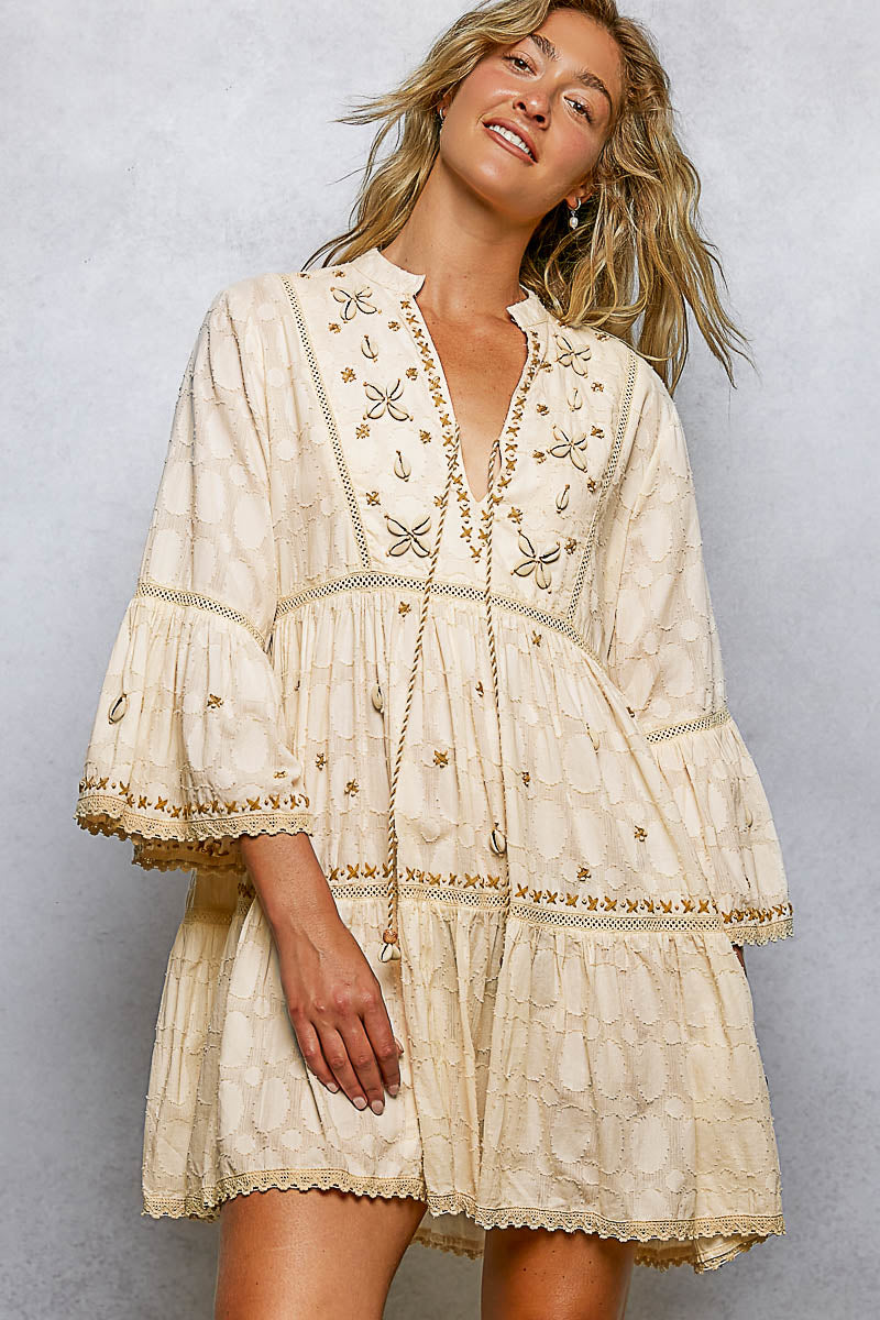 Embroidered mini dress with shell detail