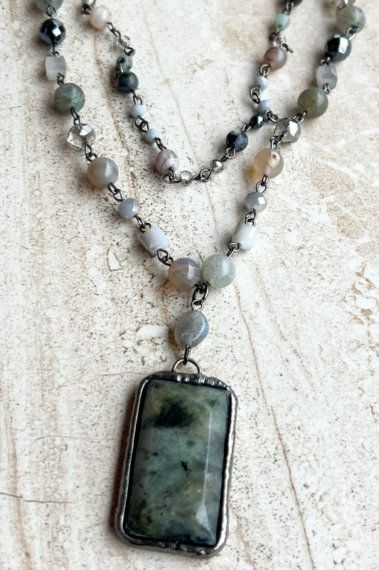 Multi strand with rectangular stone pendant