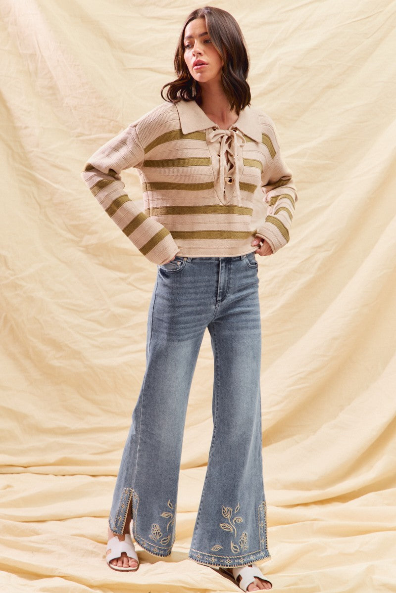 Mid rise embroidered hem jeans