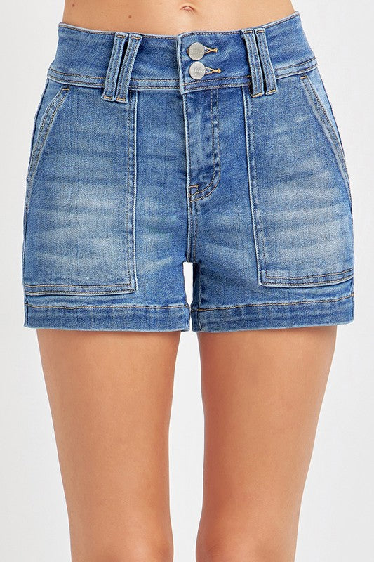 High rise patched pocket medium wash shorts by Risen