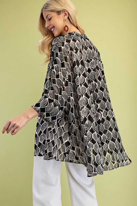 Loose fit sheer blouse