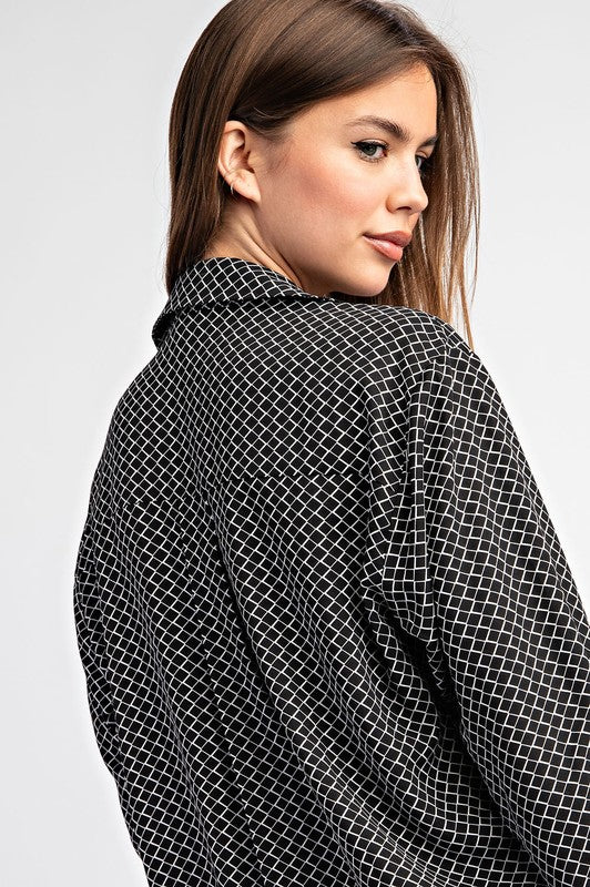 Black and white geometric print blouse