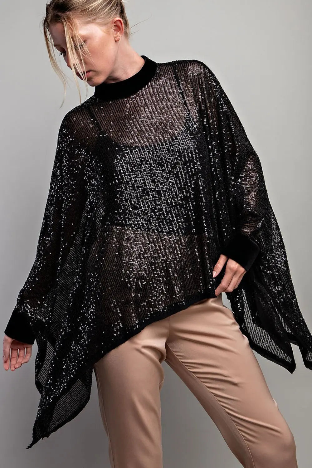 Black sequin poncho top with velour trim