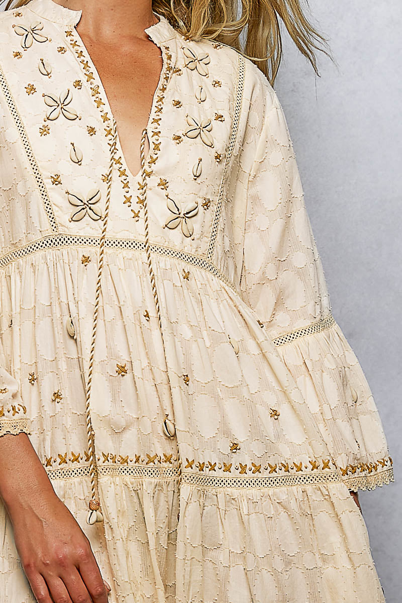Embroidered mini dress with shell detail