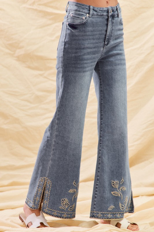 Mid rise embroidered hem jeans